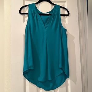 Teal sleeveless blouse